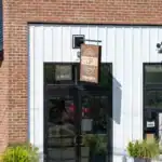 Baltic Coffee Company storefront with brick and white metal exterior in Baltic, Ohio