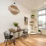 Wood display shelving and seating area at Baltic Coffee Company